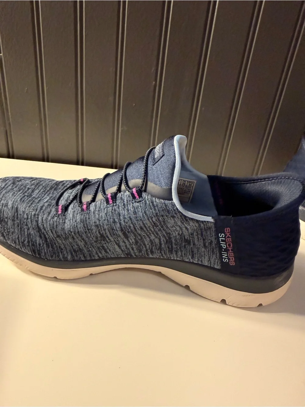 Skechers women’s slip navy -On Athletic Sneakers with Pink Accents